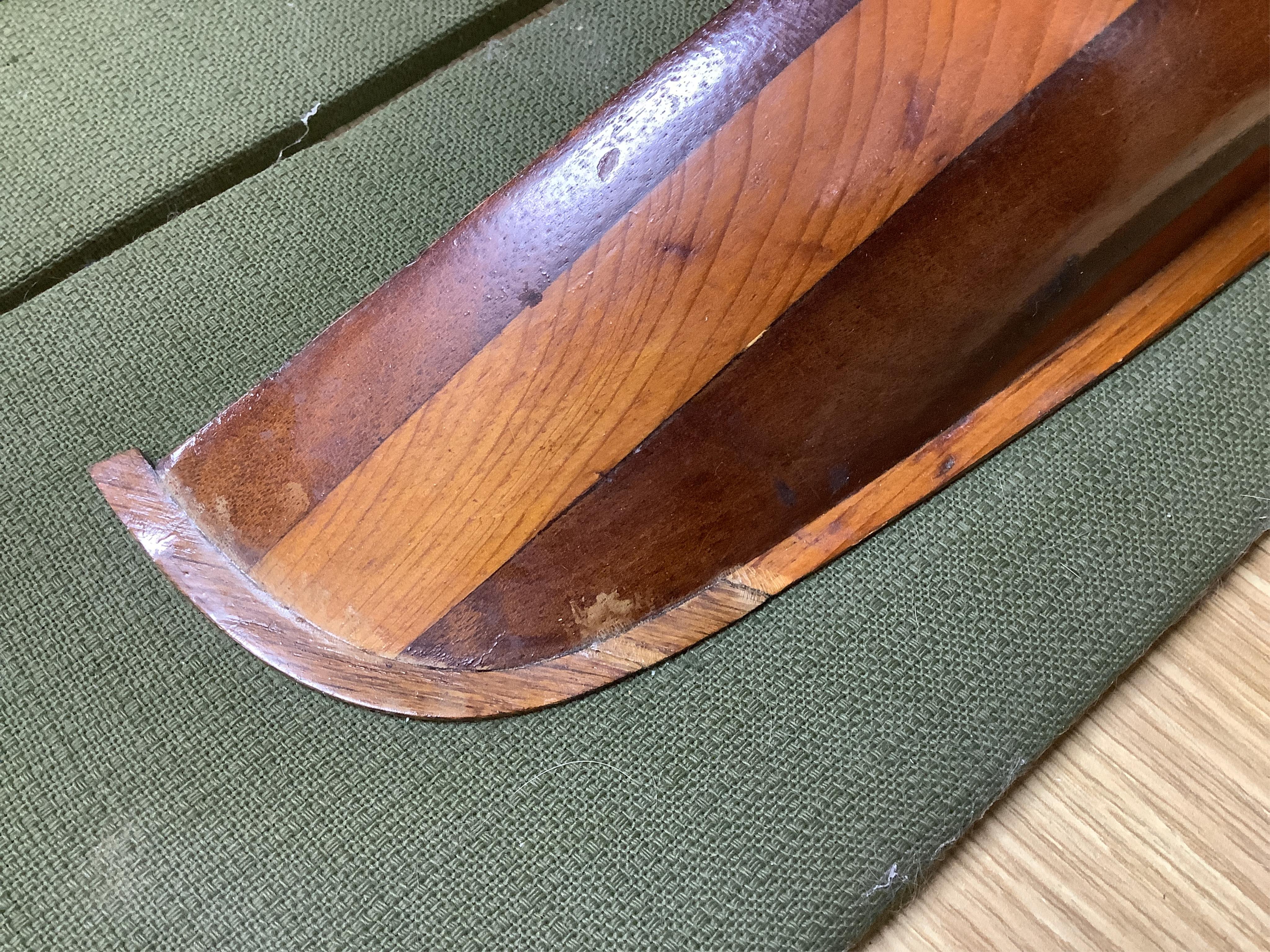 Two mounted cross banded mahogany and yew wood split hull models. Condition - fair to good